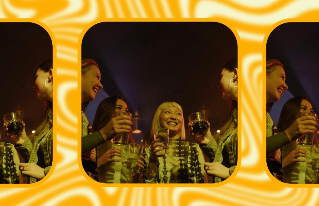 Young people socializing and drinking outdoors