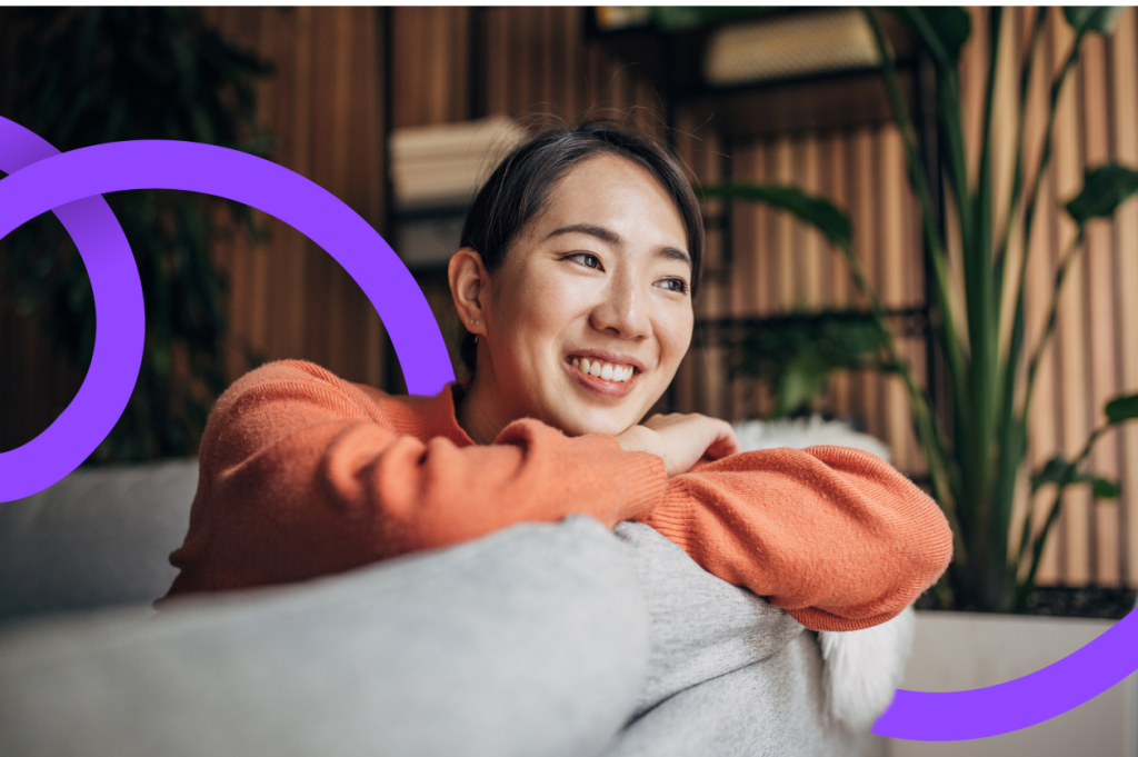 Young woman smiling on the couch
